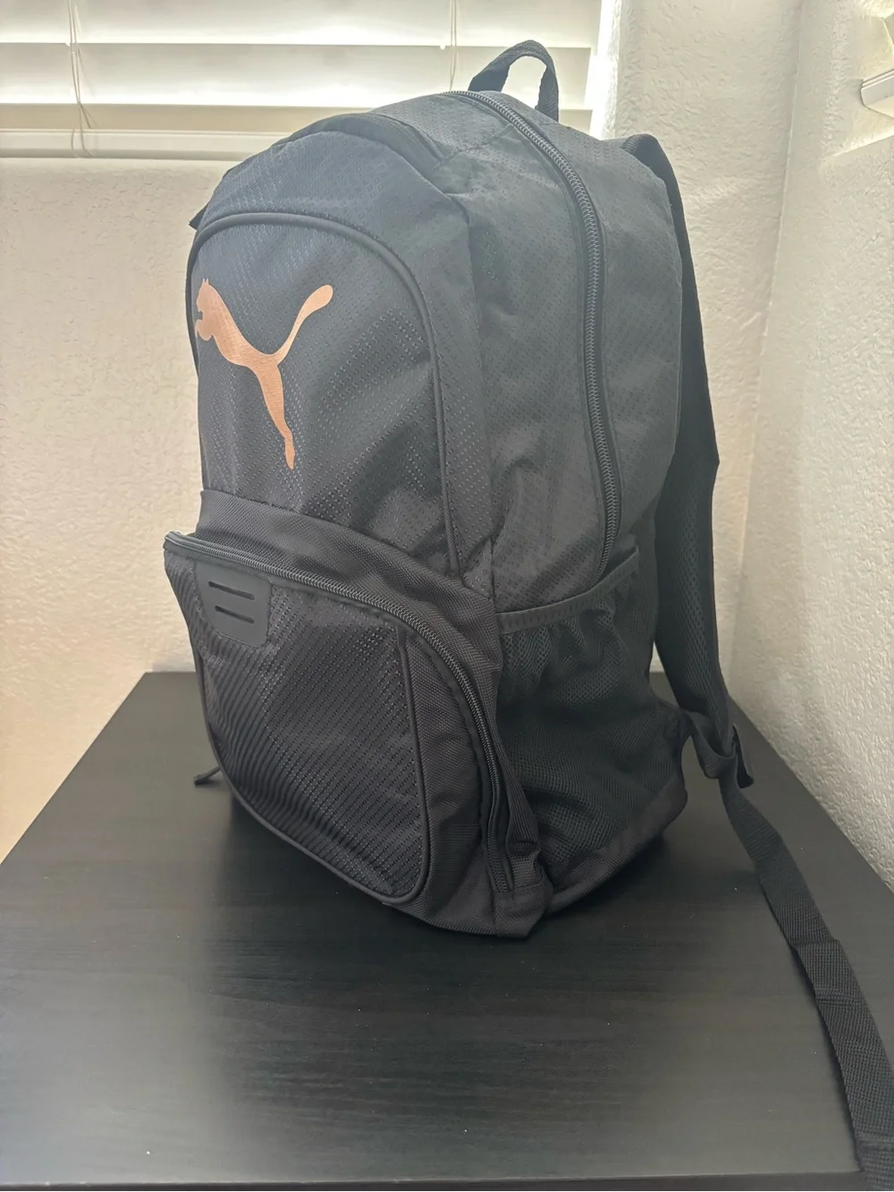 Puma Black Backpack with Copper Puma Logo